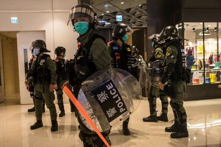 Hong Kong police sift the past to pursue new security law crimes