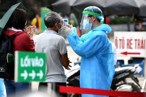 Vietnam curbs movement in city of 1.1 million as virus-free run ends