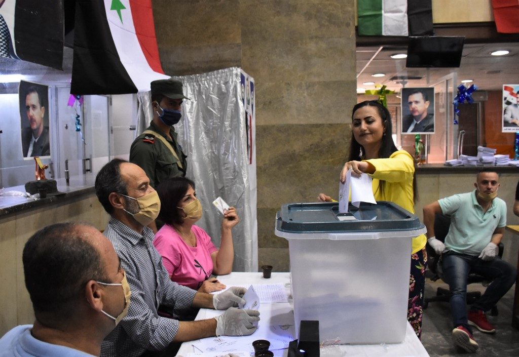 Syrians vote for new parliament amid war, economic turmoil