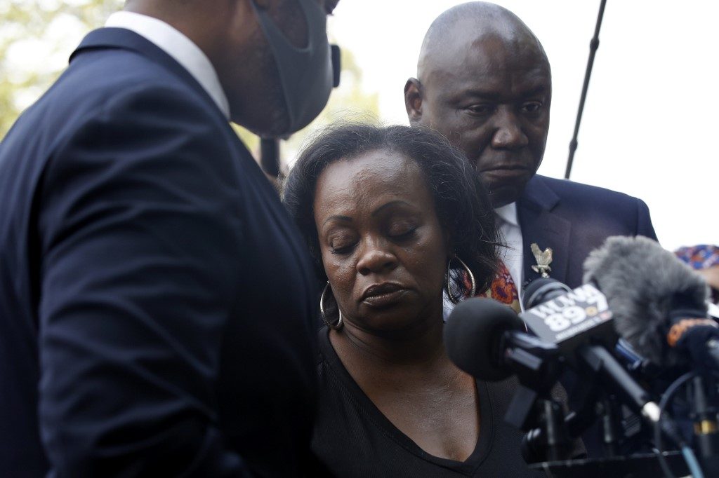 Mother of Black US man left paralyzed in police shooting calls for calm