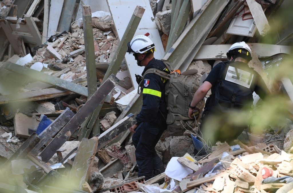 Rescuers scour Beirut blast zone as first arrests made