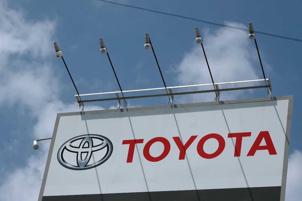 Toyota warns of 64% drop in full-year net profit