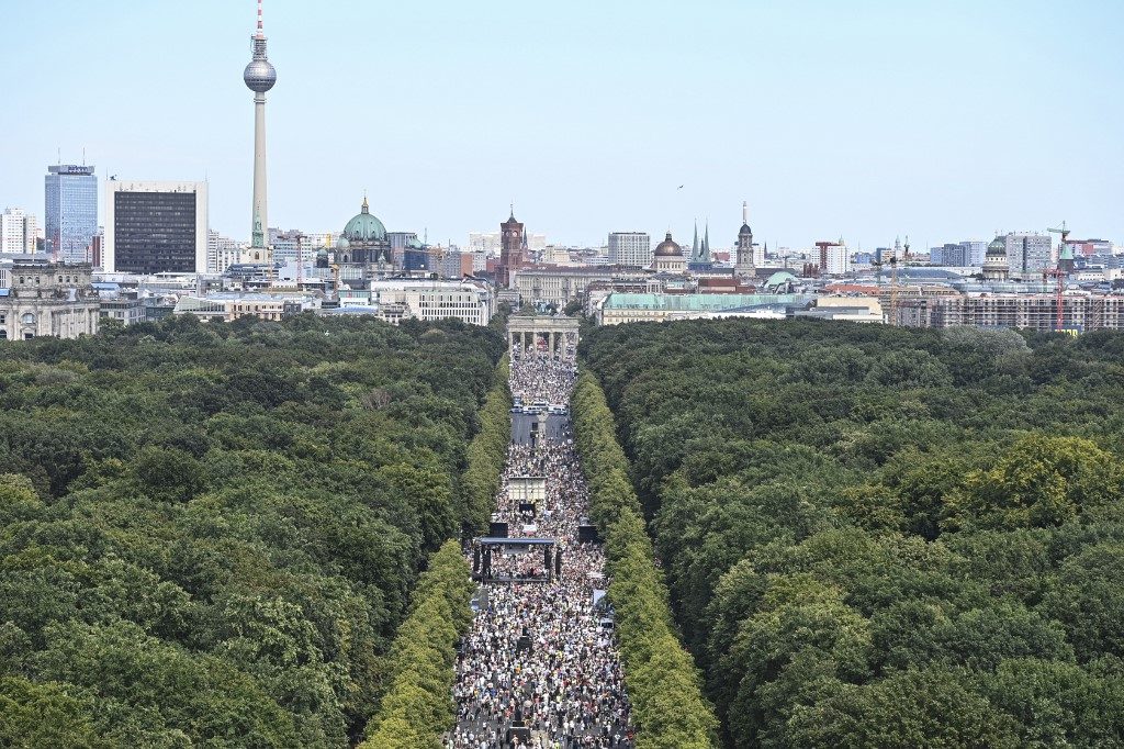 Berlin protest over virus restrictions draws thousands