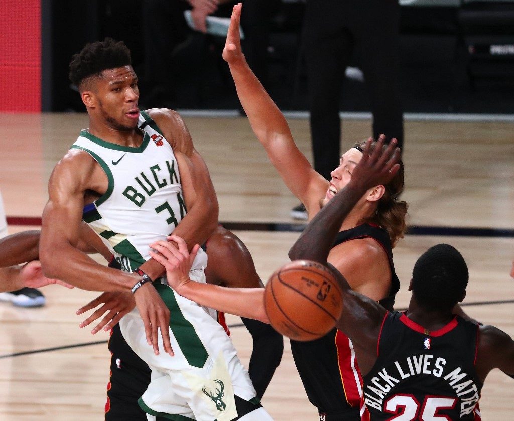 Bucks rally past Heat to clinch East top seed