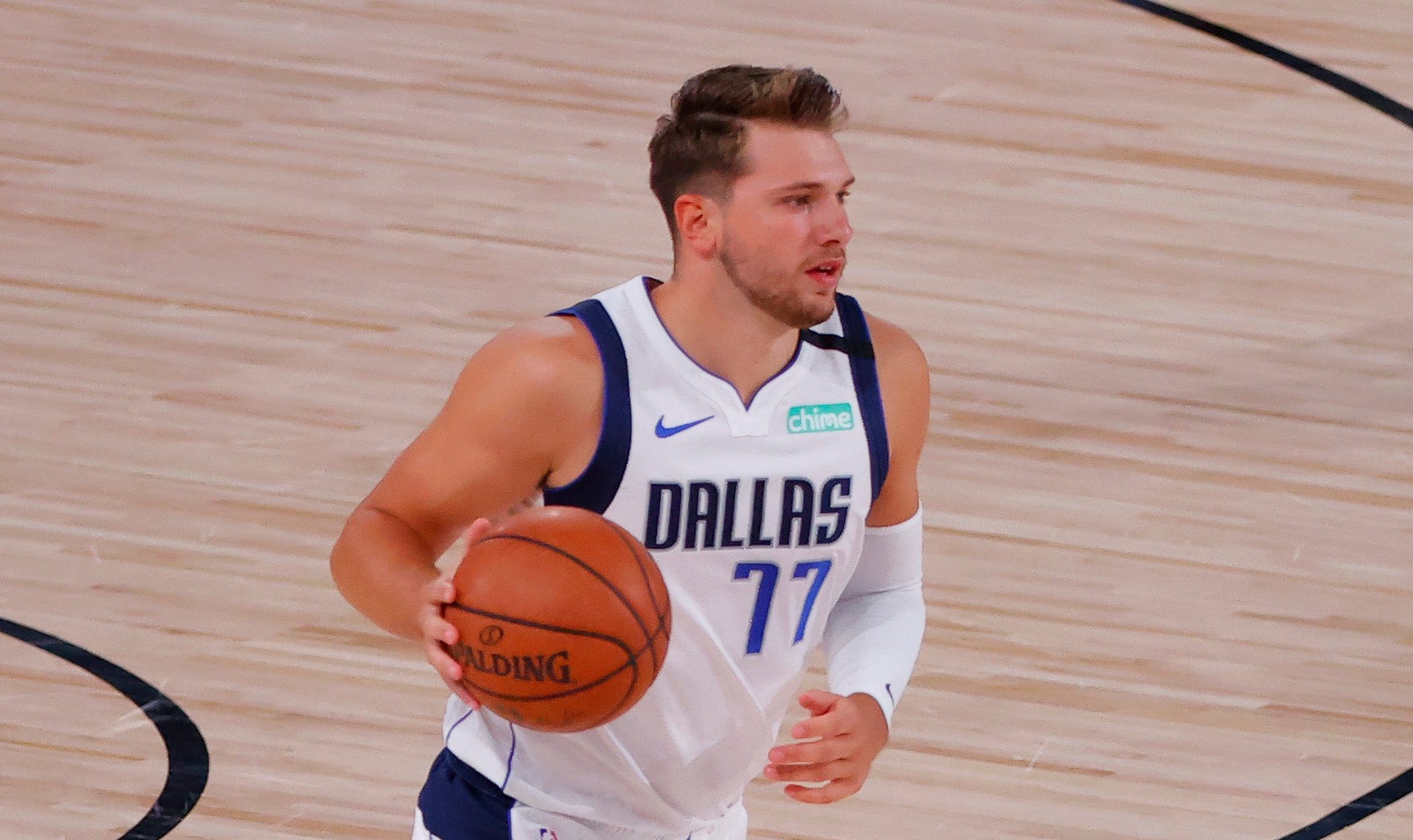 Doncic puts on passing clinic as Mavs escape Bucks in OT