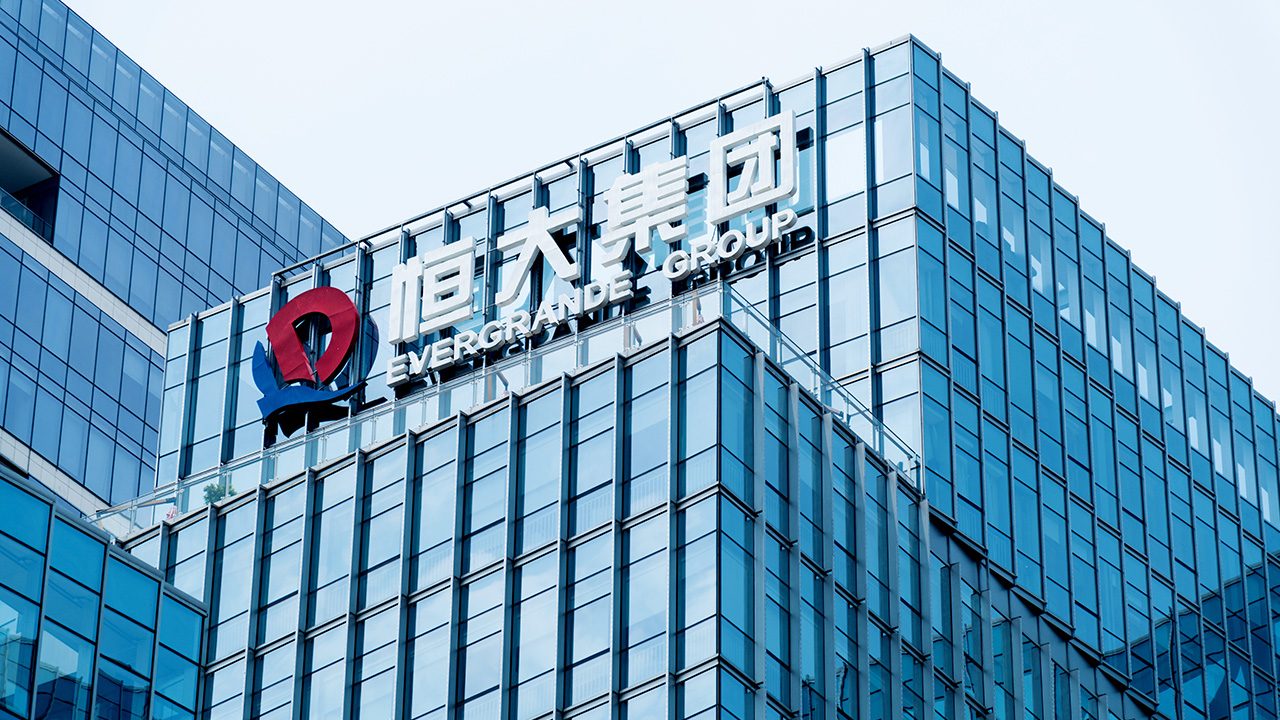 China real estate giant Evergrande surges as it averts crisis