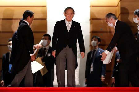 Japan’s new PM Suga pledges to tackle virus, kickstart economy