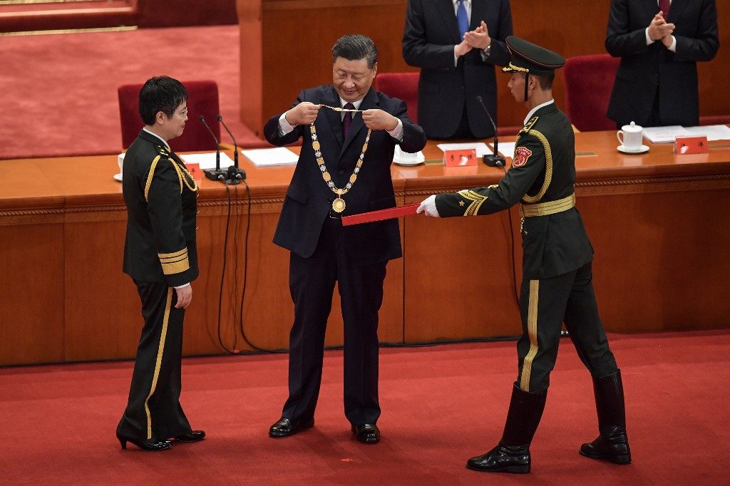 China passed ‘extraordinary’ virus test, says bullish Xi