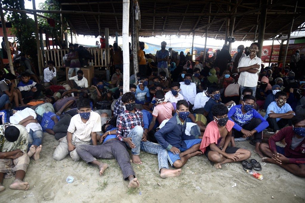Nearly 300 Rohingya migrants reach Indonesia ‘after 7 months at sea’