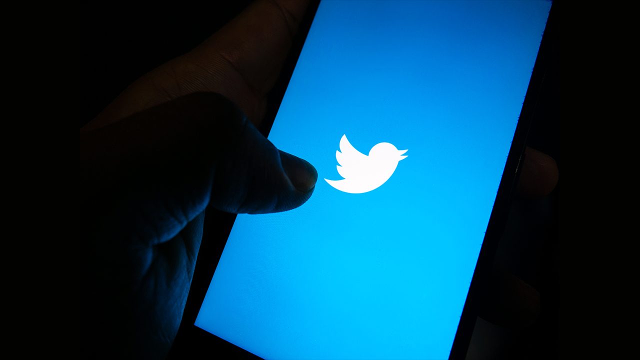Twitter shares sink as user growth slows