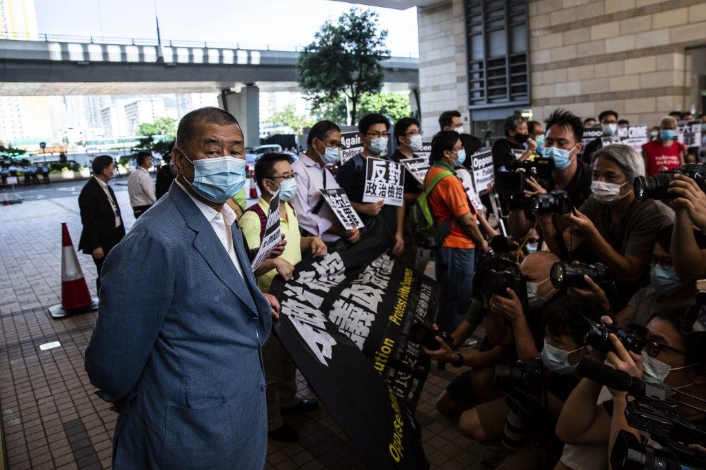 Hong Kong police raid pro-democracy media tycoon’s office