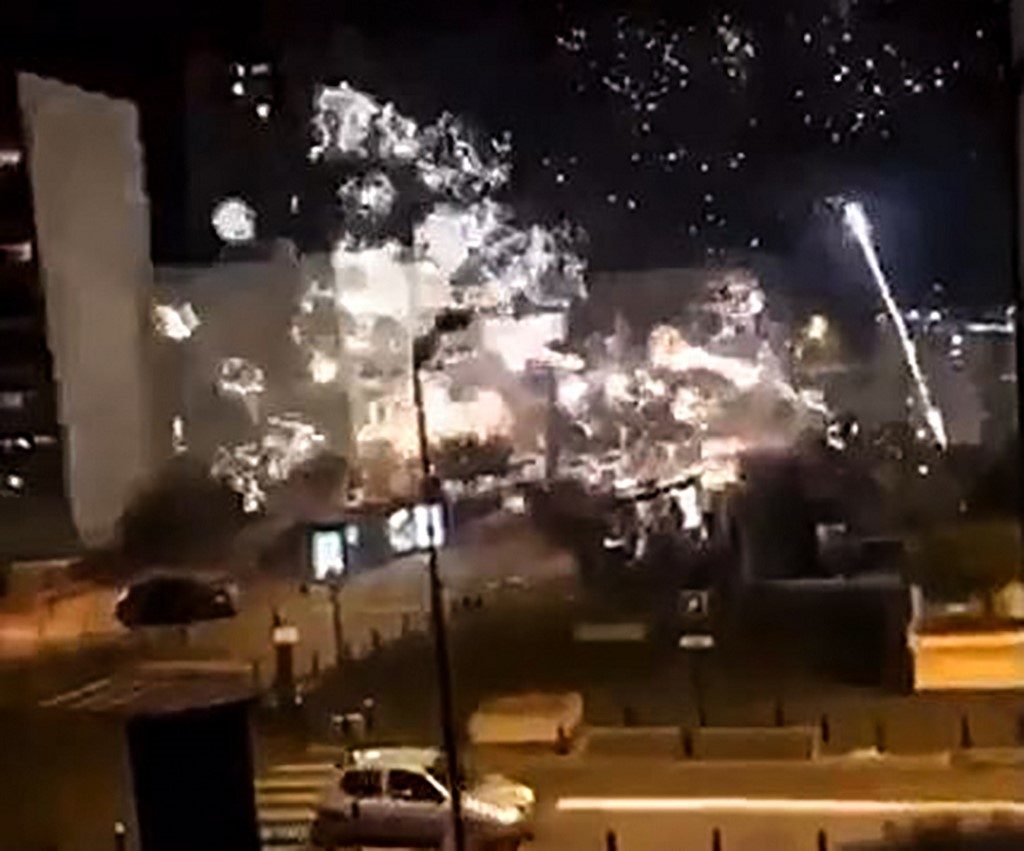 Police station outside Paris targeted in fireworks attack