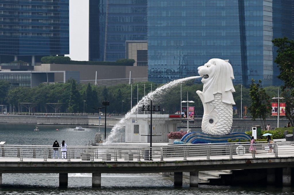 Singapore’s economy shrinks at slower pace as virus curbs eased