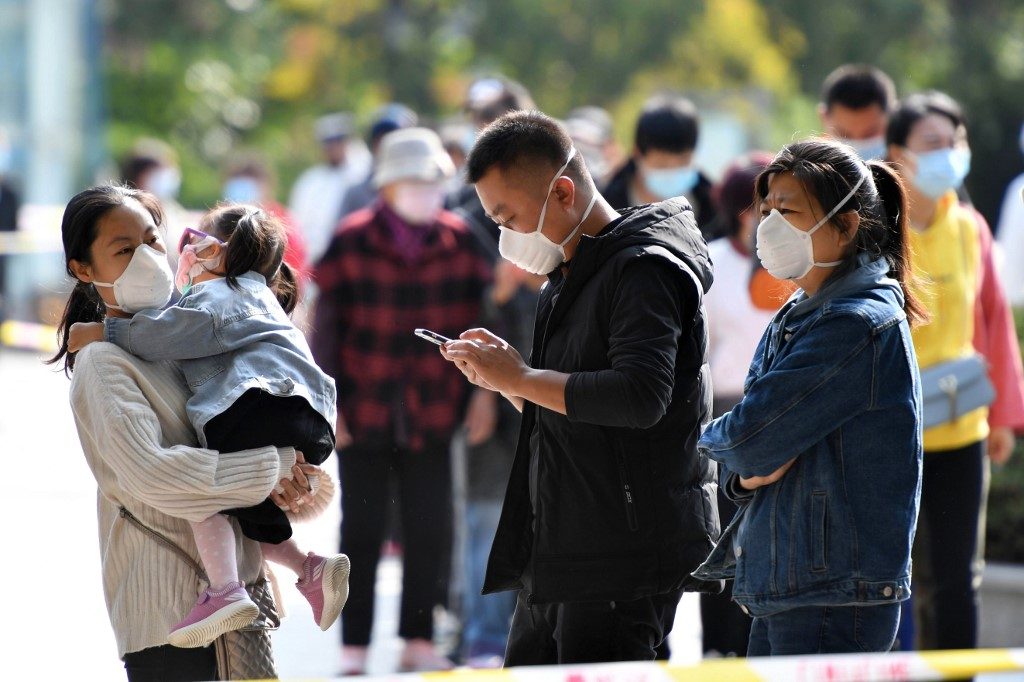 China to test whole city of 9 million as Europe rolls out new virus rules