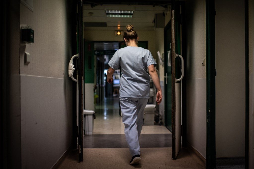 Virus-drained nurses hang up uniforms for other jobs