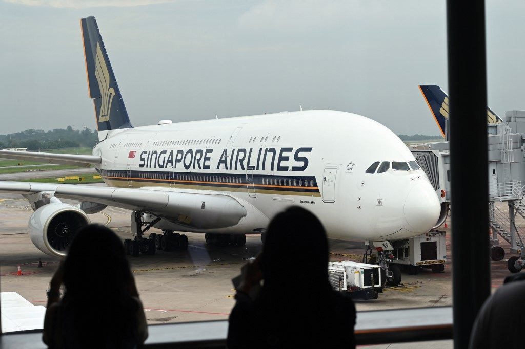 Singapore Airlines suffers record loss as virus hits aviation