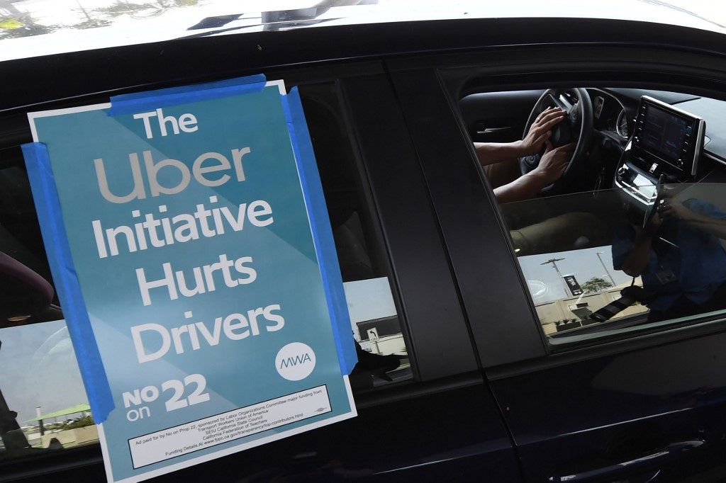Uber-backed gig worker initiative wins in California – US media