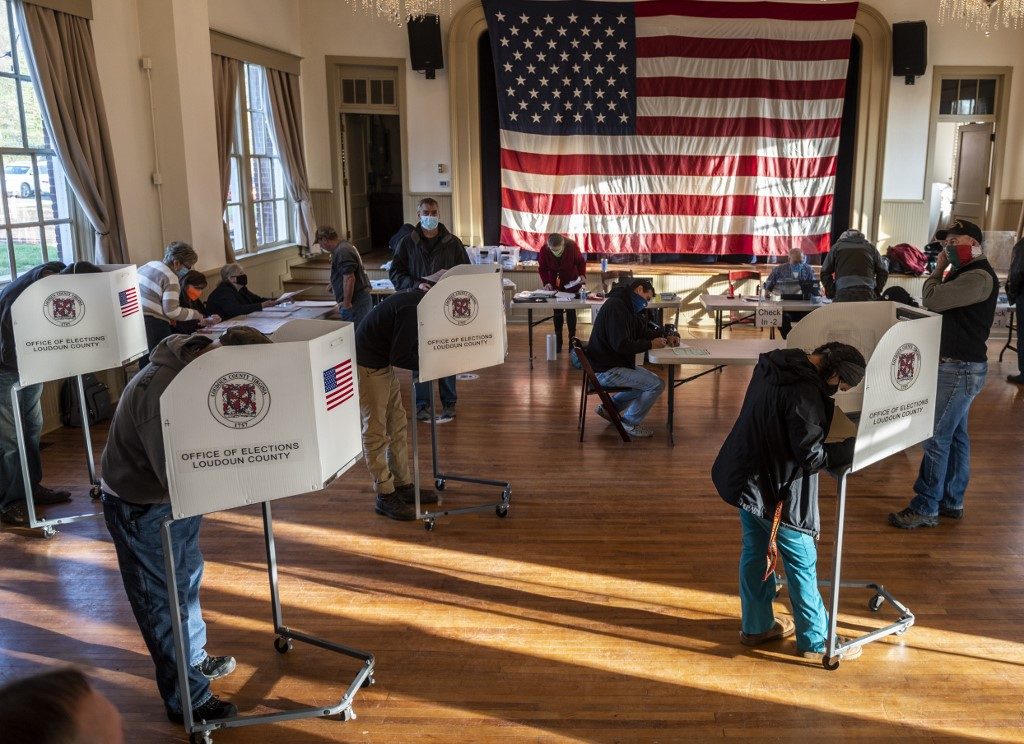 IN PHOTOS: Anxious Americans show up for an election like no other