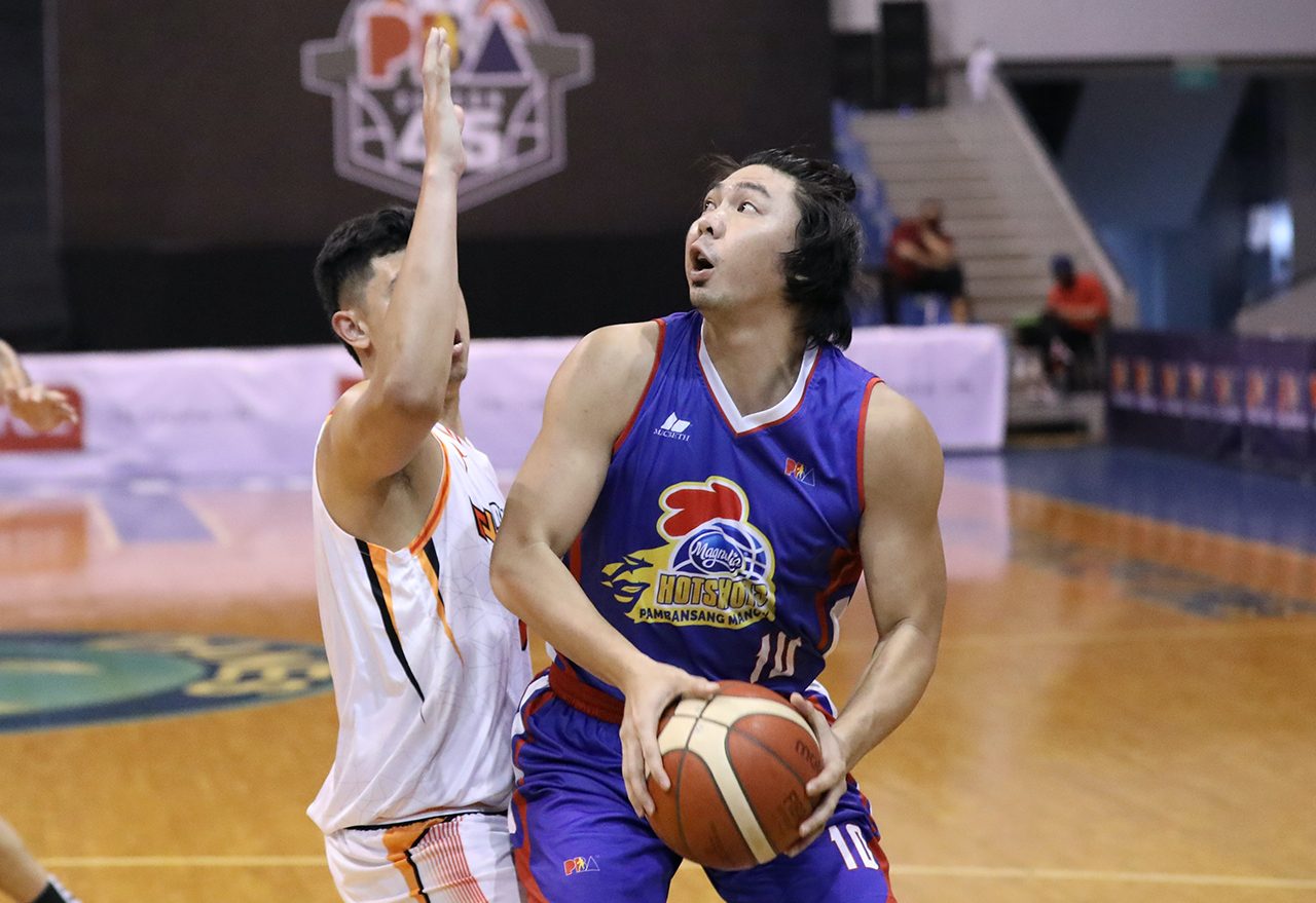 Bad back and all, Sangalang carries Magnolia to 5th straight win