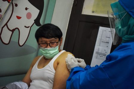 Indonesia places risky bet on Chinese coronavirus vaccines
