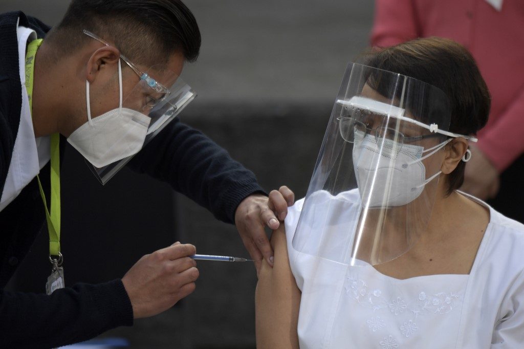 Virus-plagued Mexico begins mass coronavirus vaccination