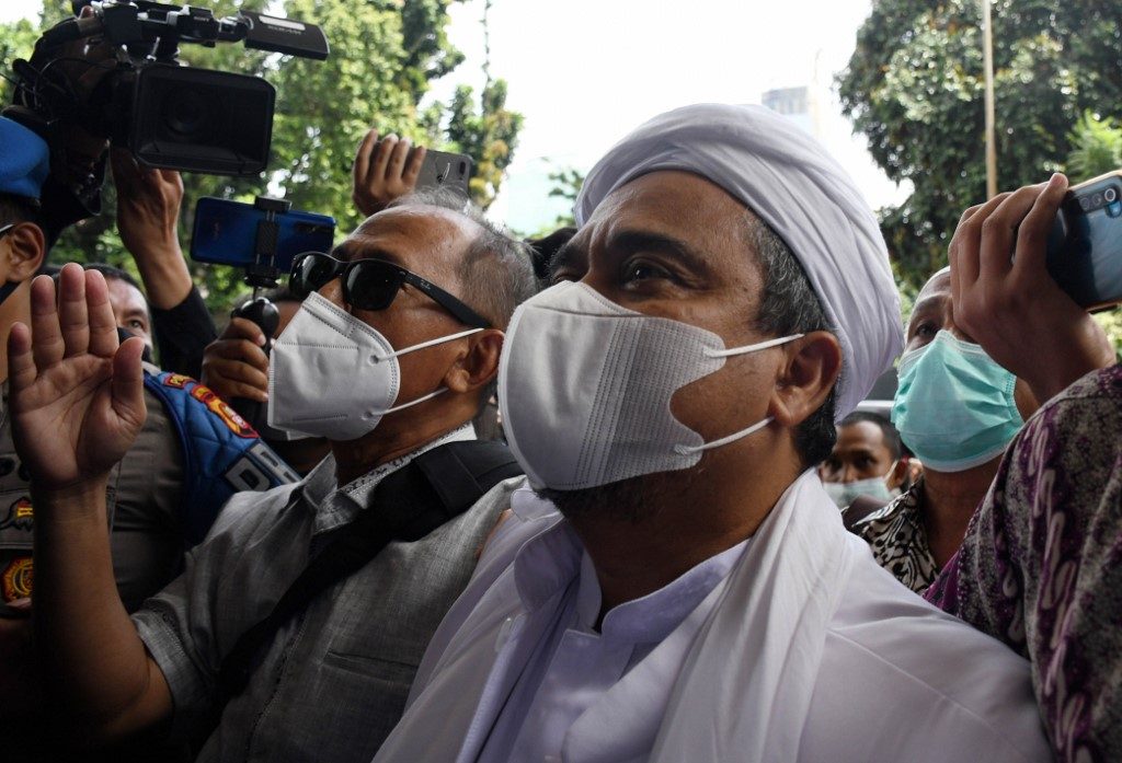 Indonesia arrests firebrand Islamist cleric over COVID-19 rule breaches