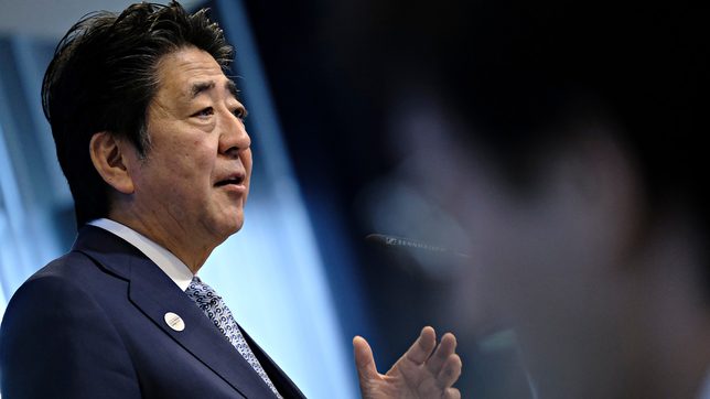 Former PM Abe says Japan, US could not stand by if China attacked Taiwan