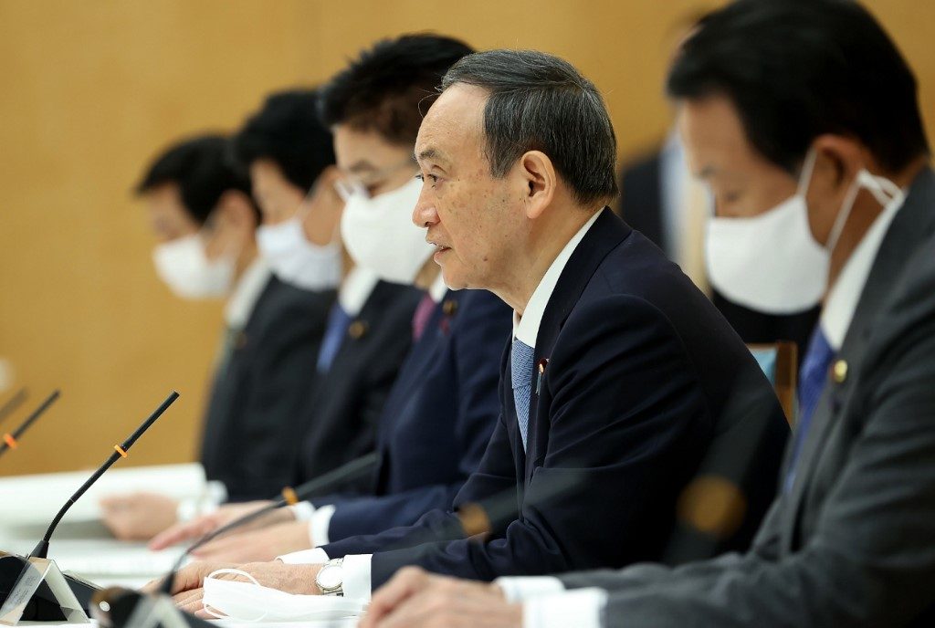 Japan approves $700-billion stimulus package
