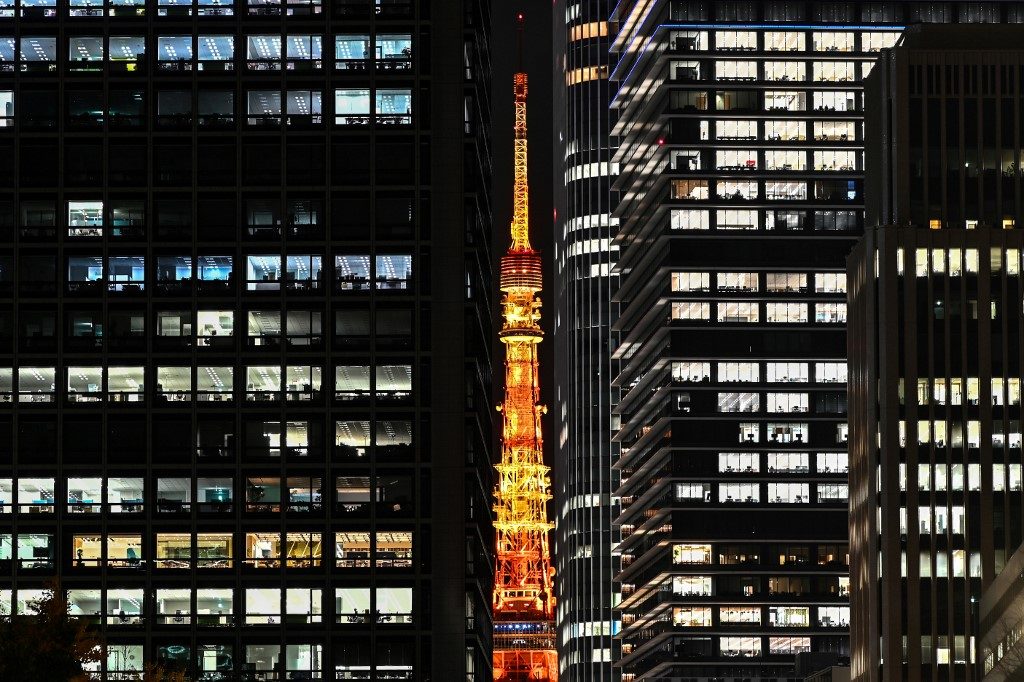 Japan business confidence improves again after virus plunge