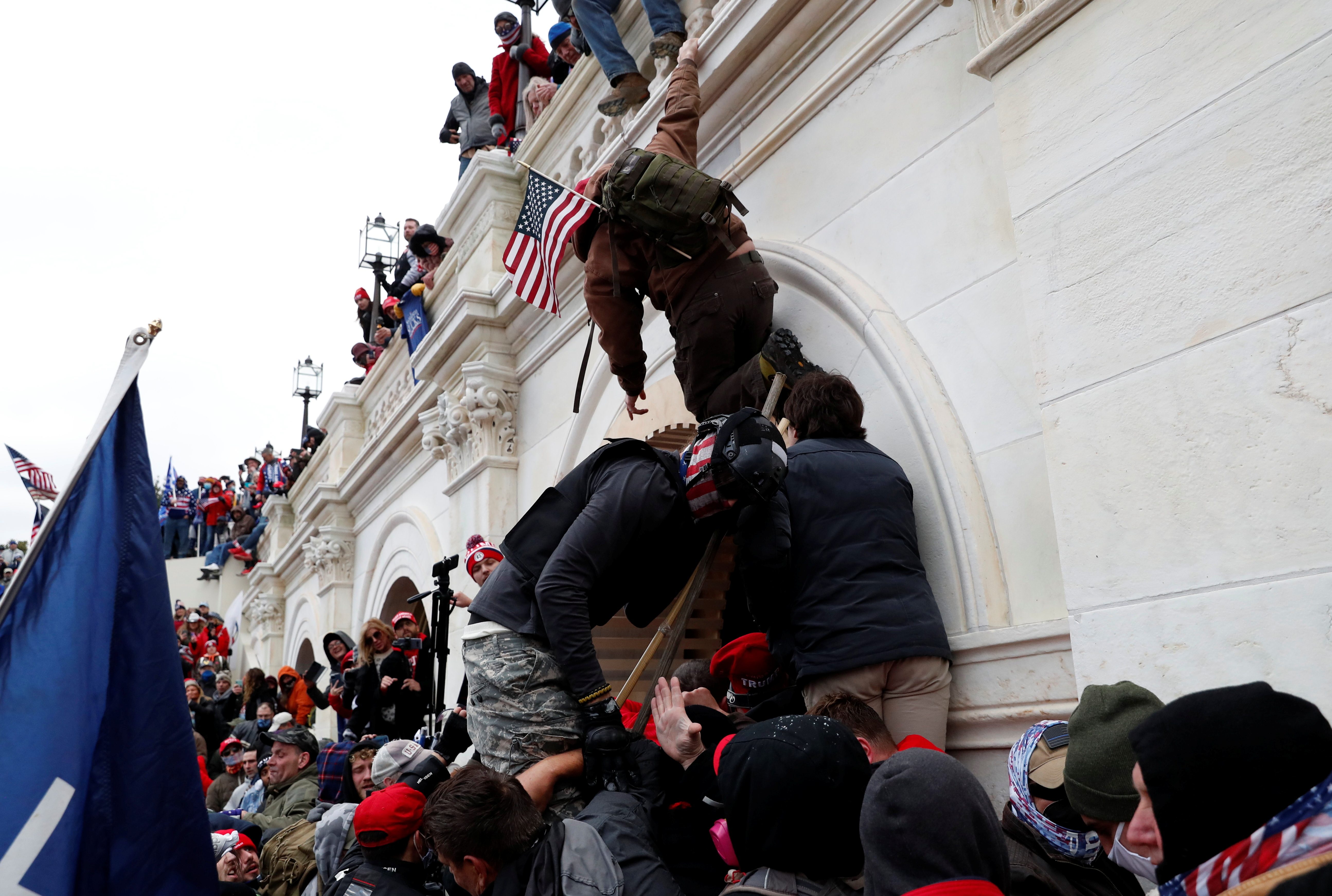 Was it a coup? No, but siege on US Capitol was the election violence of a fragile democracy