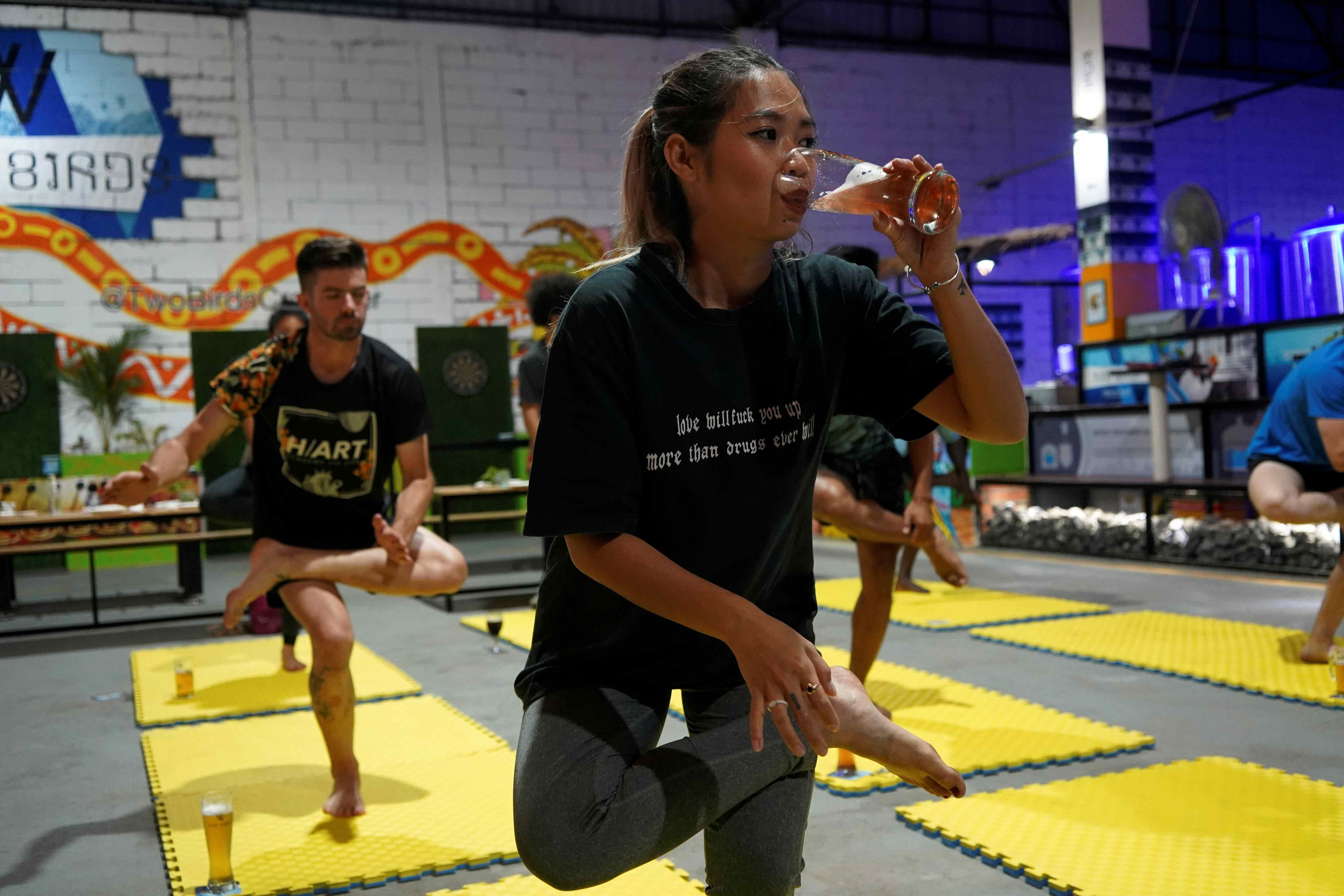 Yoga fans return to mat after lockdown – with a beer