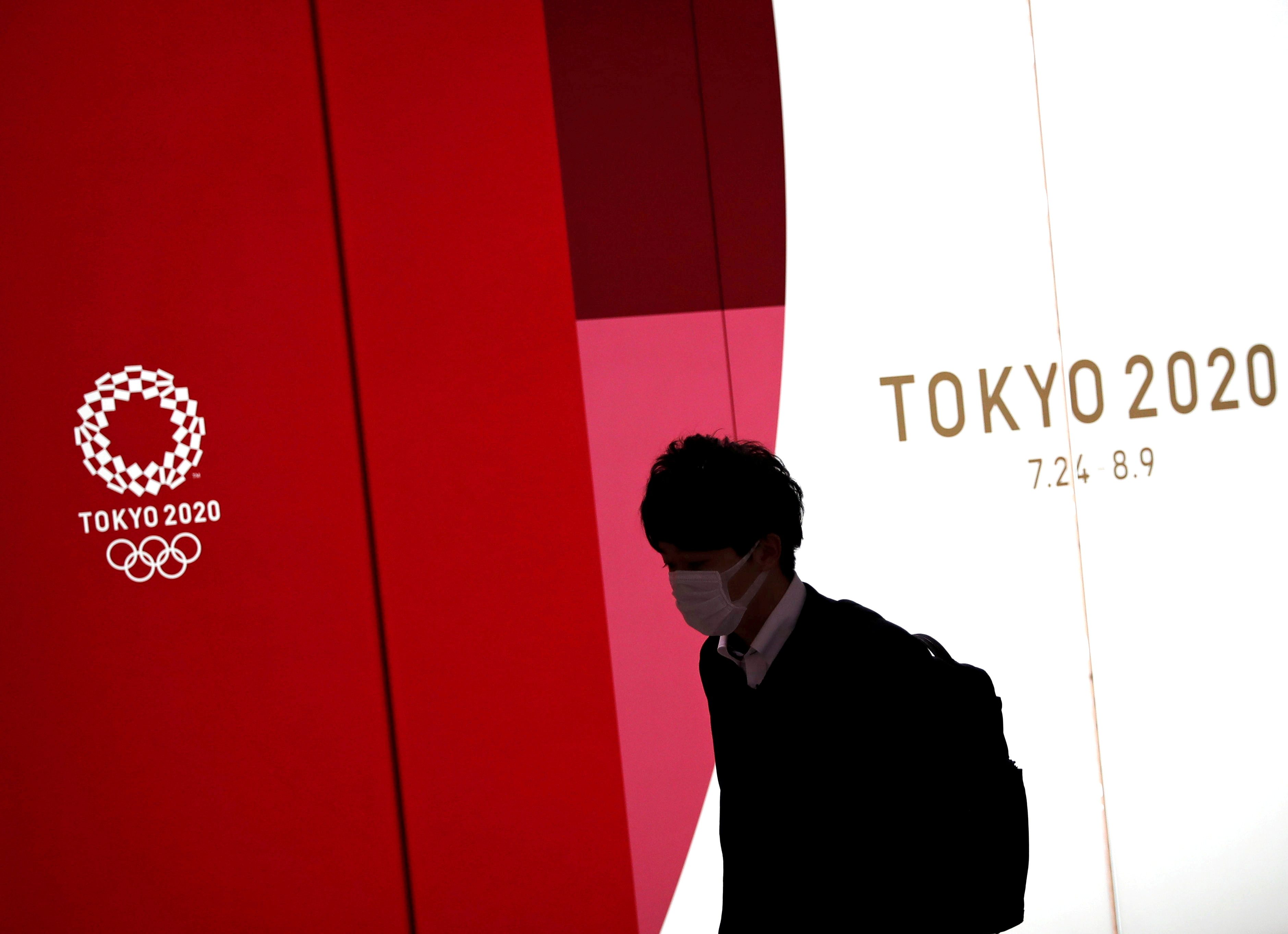 Japan doubles down on Tokyo Olympics, denies report of cancellation