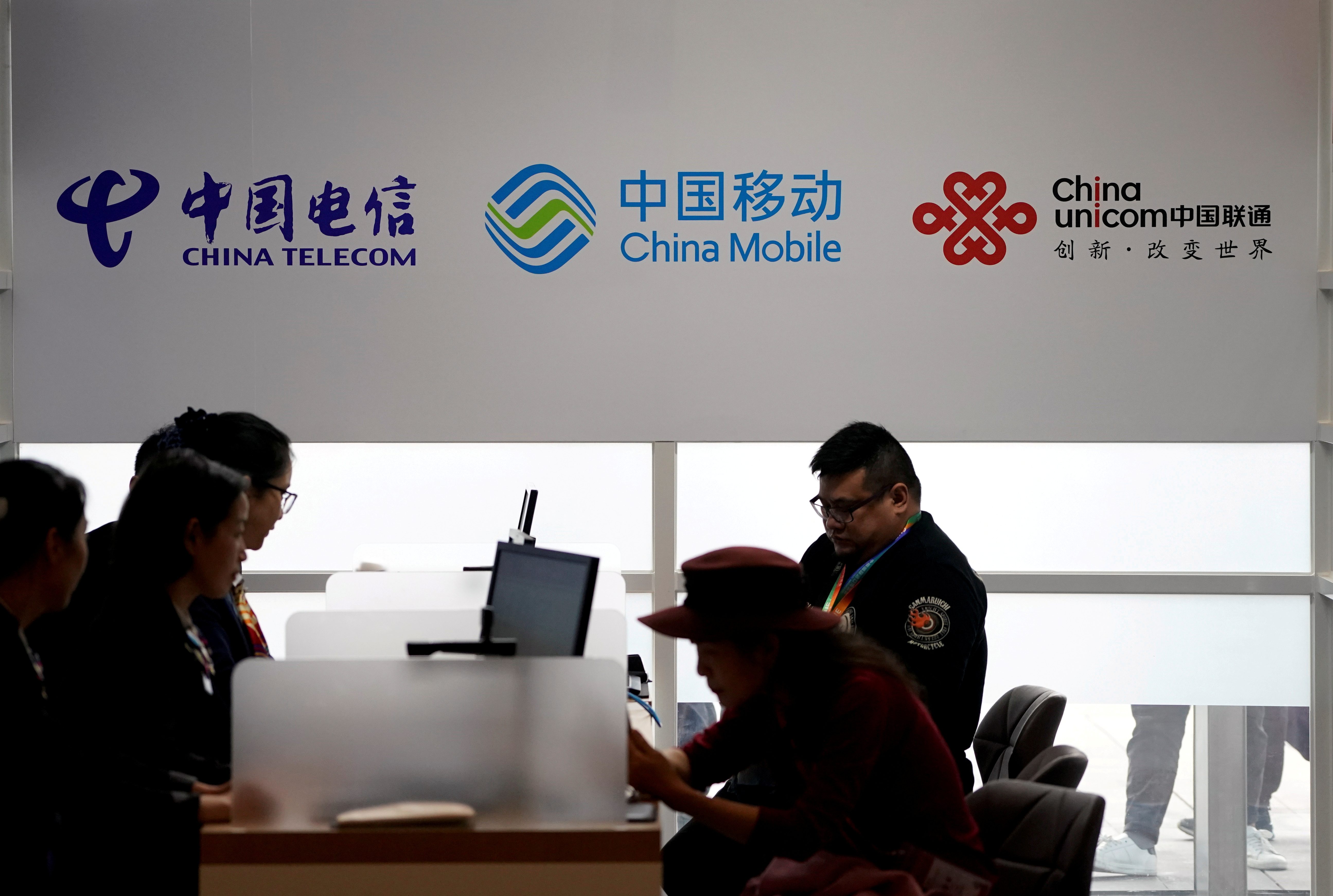 In sudden U-turn, NYSE scraps plan to delist 3 Chinese telecom firms