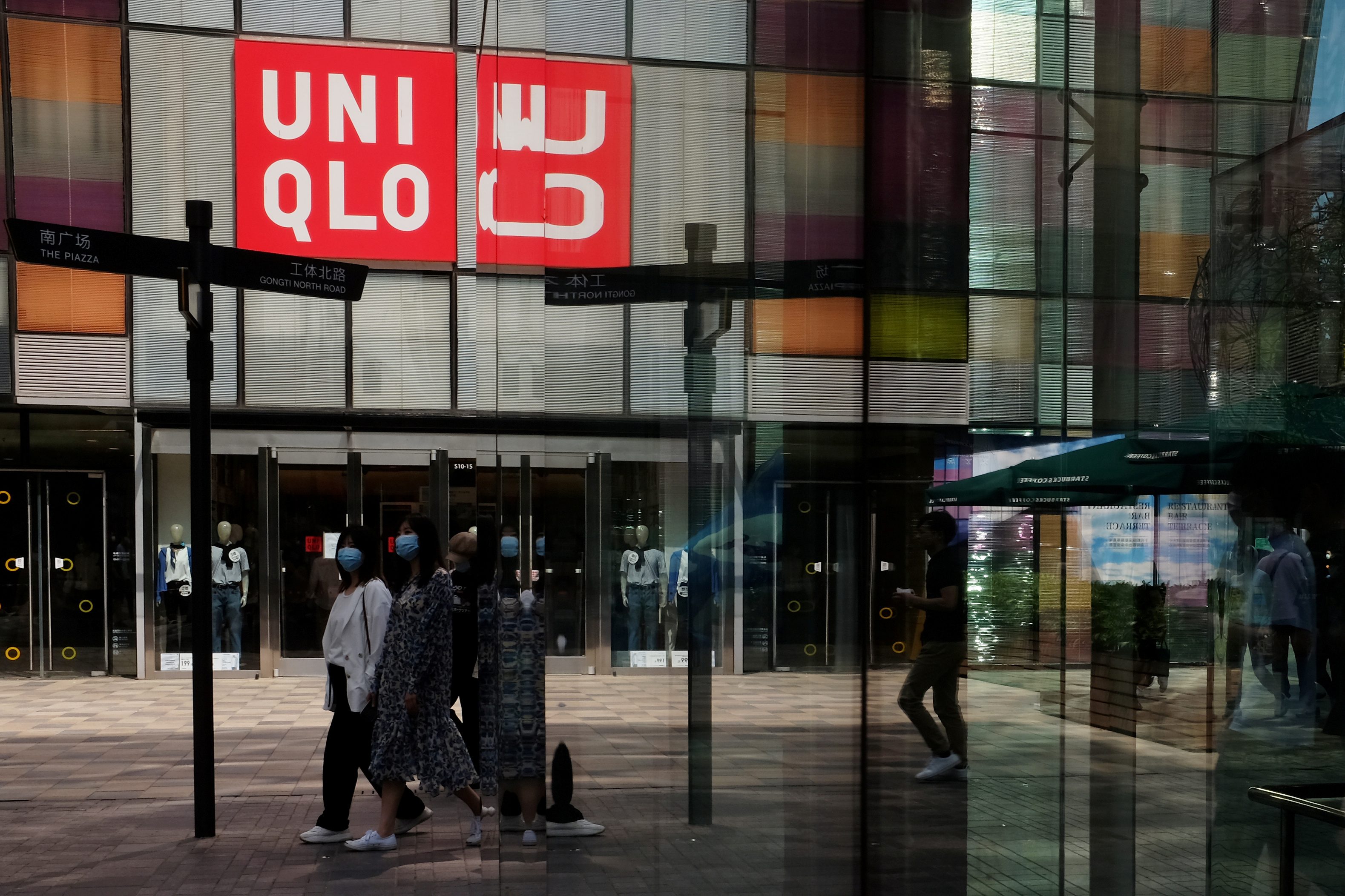 Uniqlo owner Fast Retailing says supplier plants in Myanmar set on fire