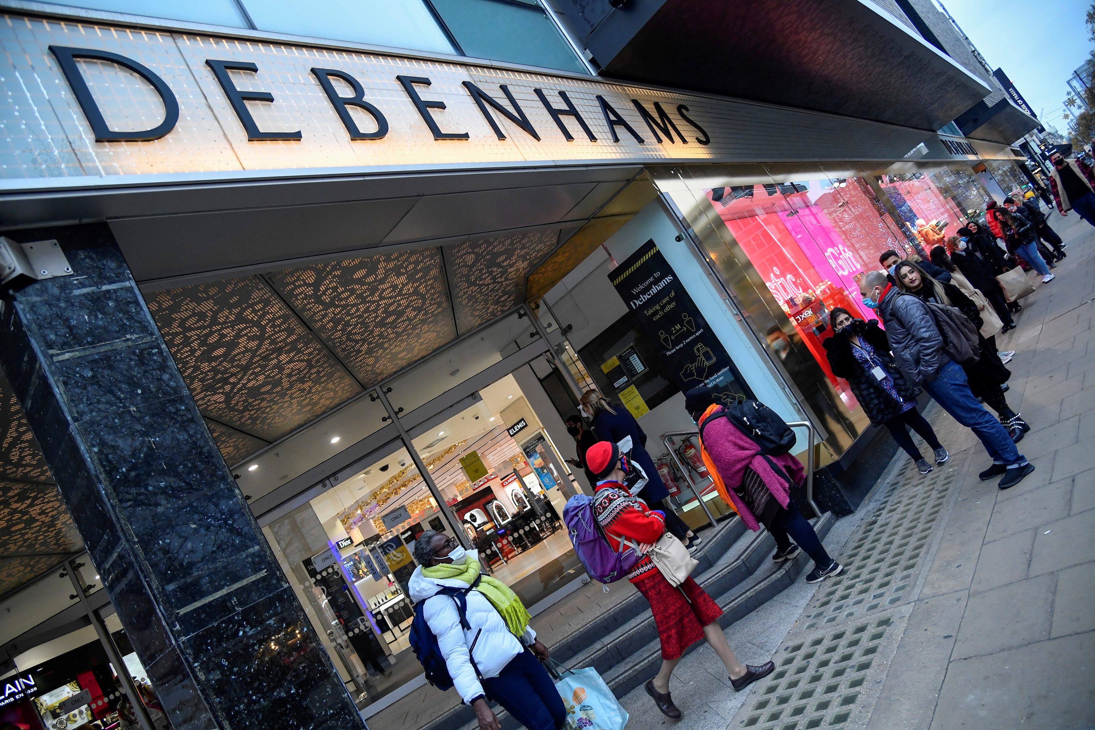 Britain’s Boohoo buys Debenhams brand while ASOS moves for Topshop