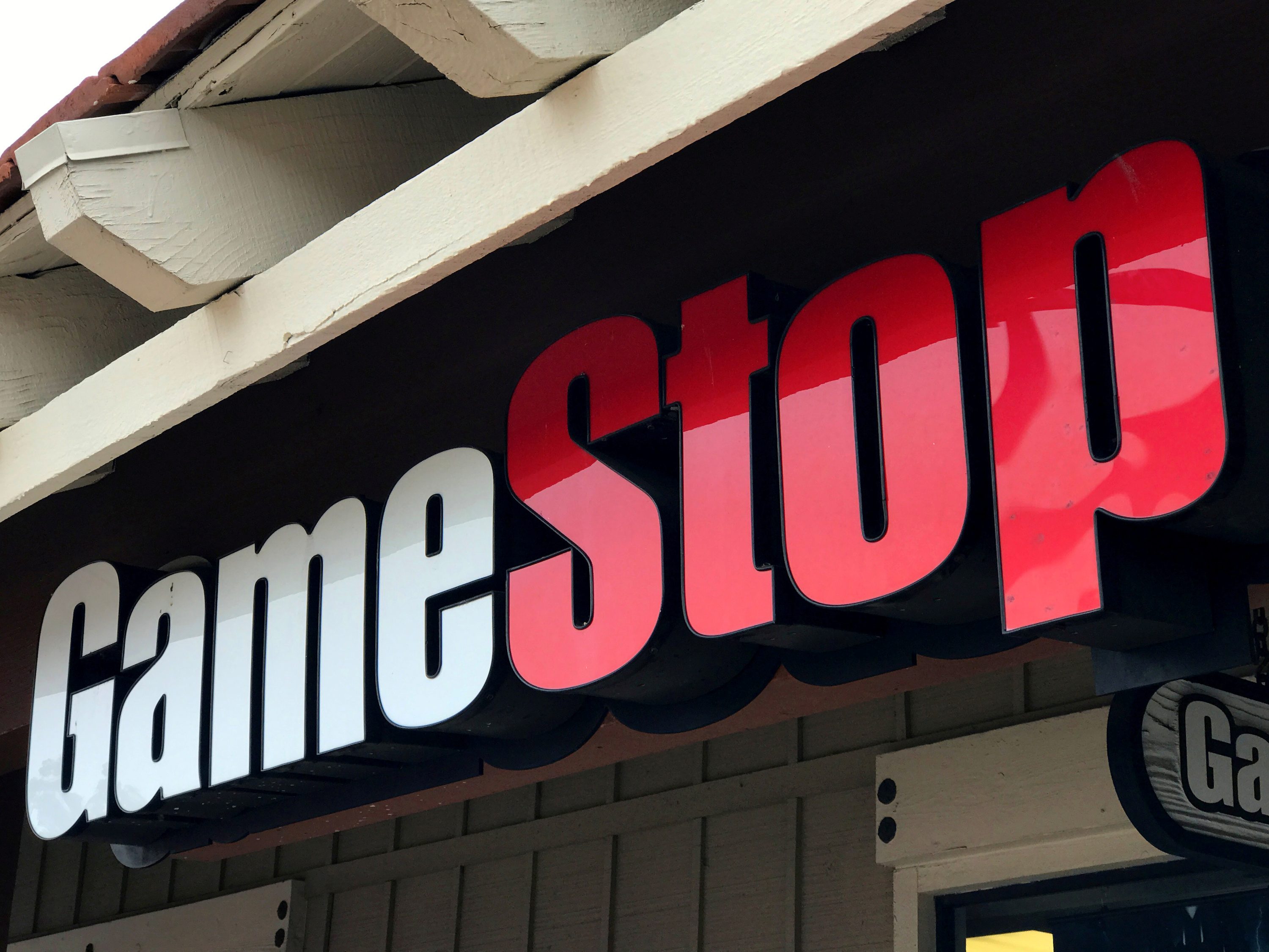 Small investors behind surge in GameStop and other shares hit by restrictions