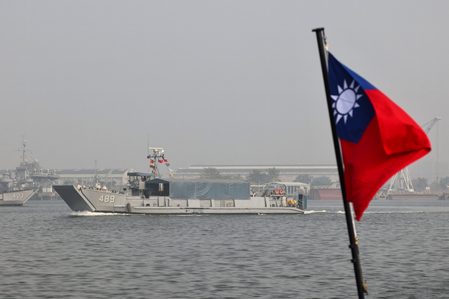 China says US ‘creating tensions’ after warship sails near Taiwan
