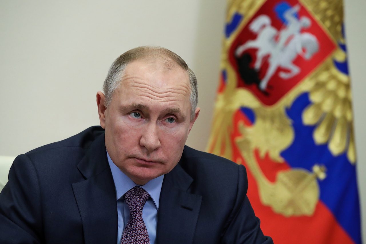 Putin signs law that could keep him in Kremlin until 2036