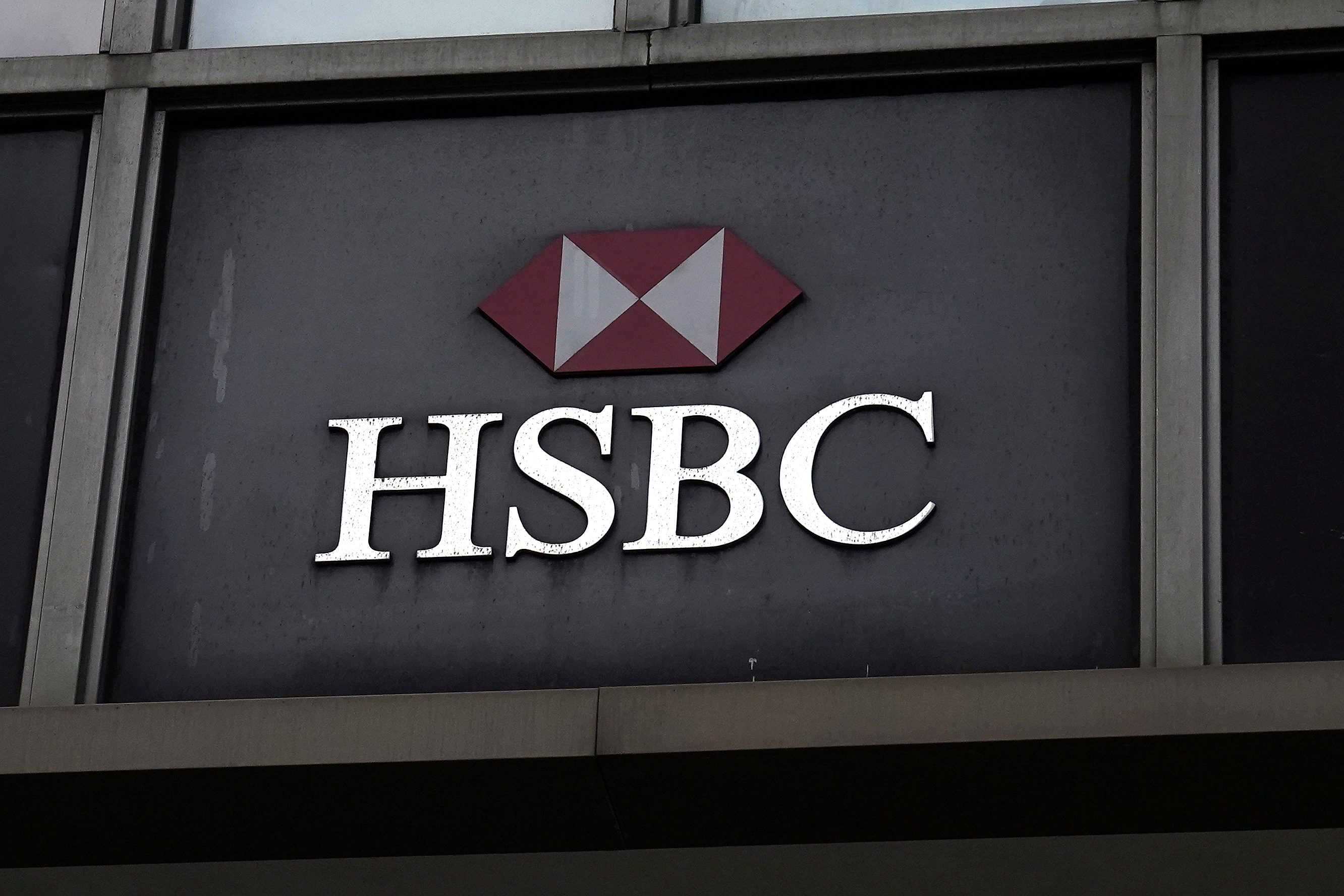 HSBC curbs profit and payout ambitions, bets on Asia wealth