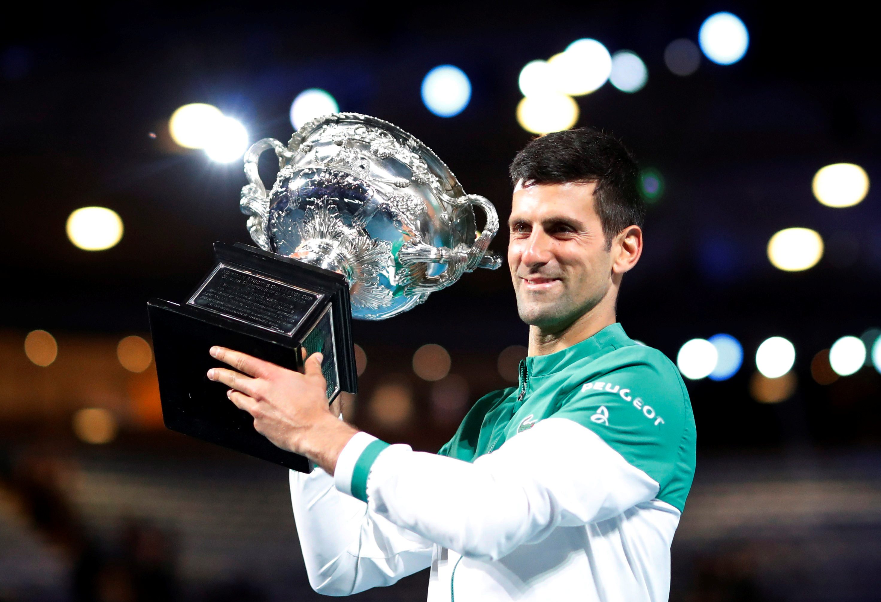 Djokovic goes from ‘persona non grata’ to 9-time champ