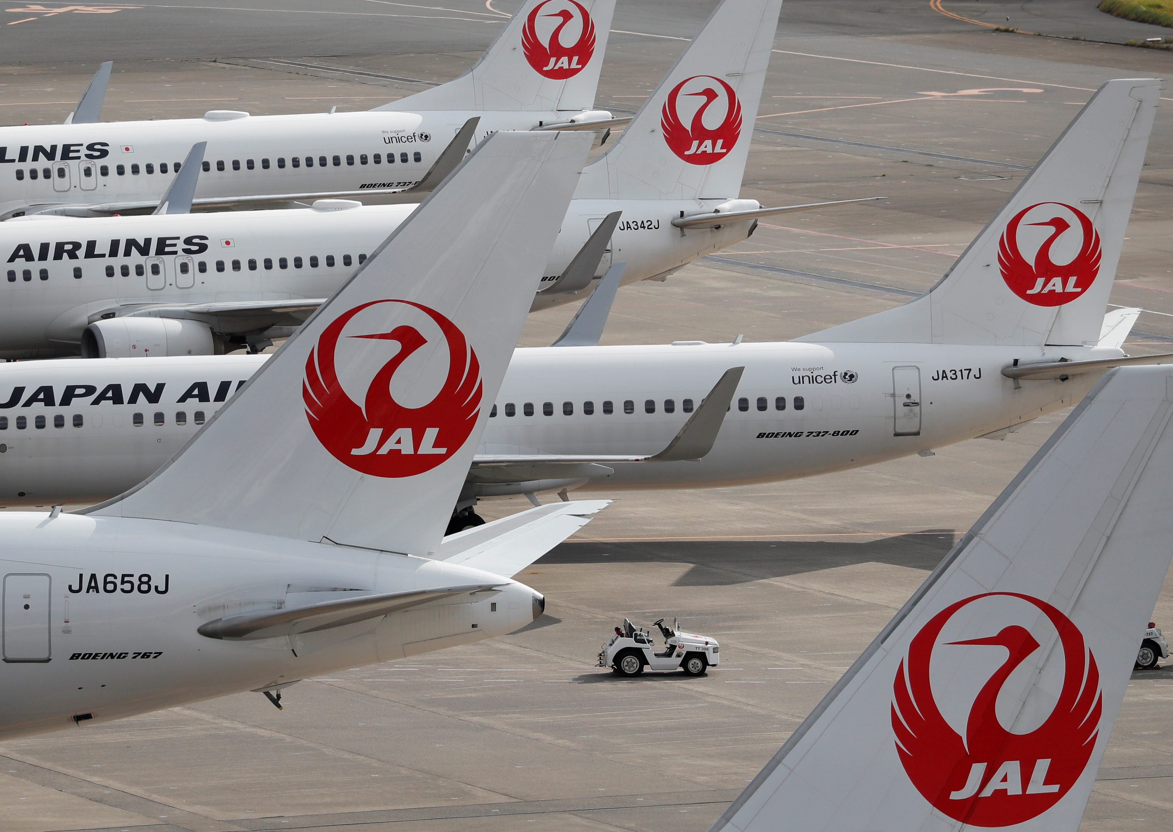 Japan Airlines deepens loss forecast as coronavirus infections surge