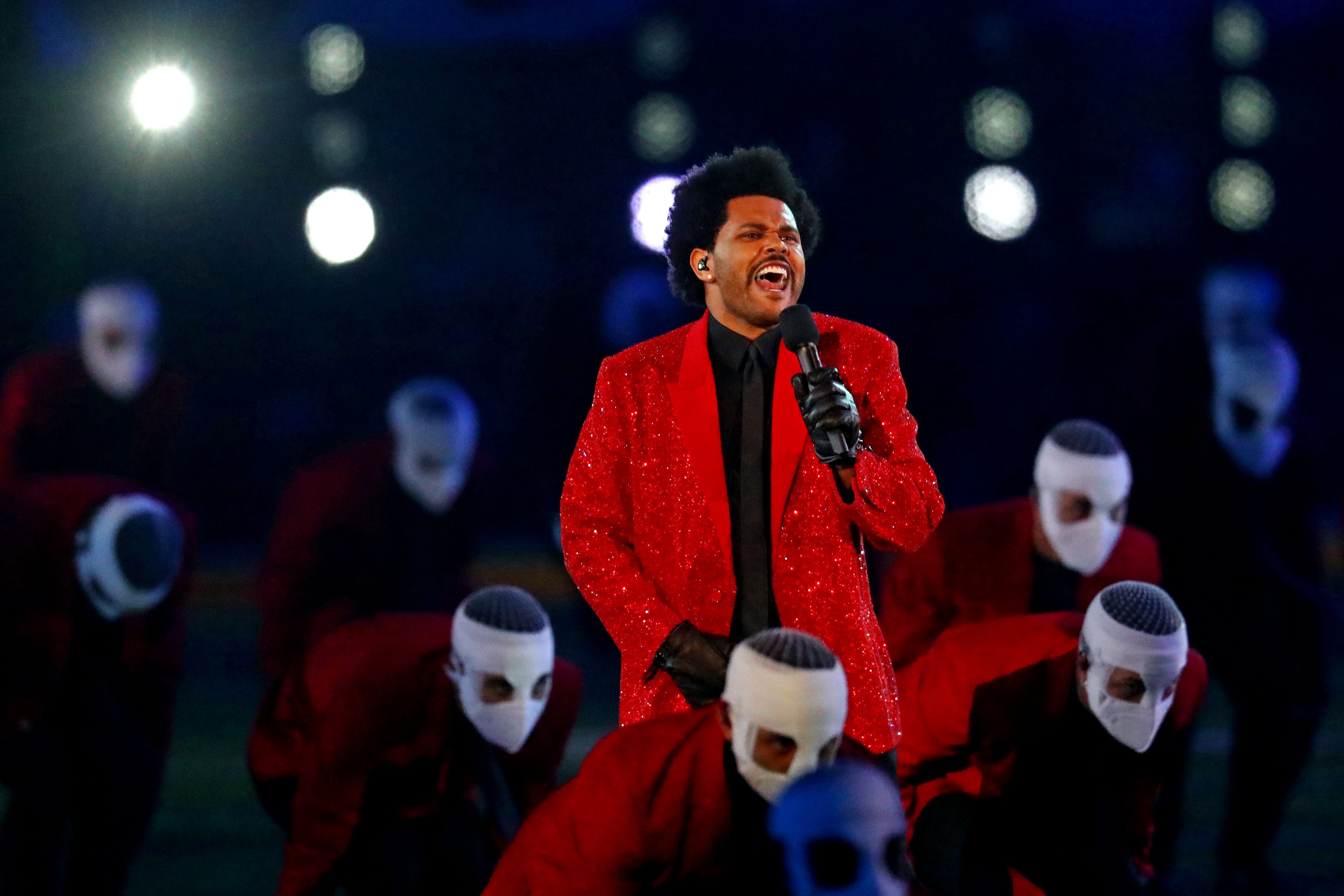 WATCH: The Weeknd brings bright lights, bandaged dancers to Super Bowl