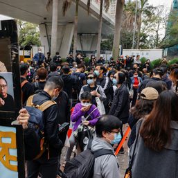 Hong Kong activists chant protest slogans as crowds gather for subversion hearing
