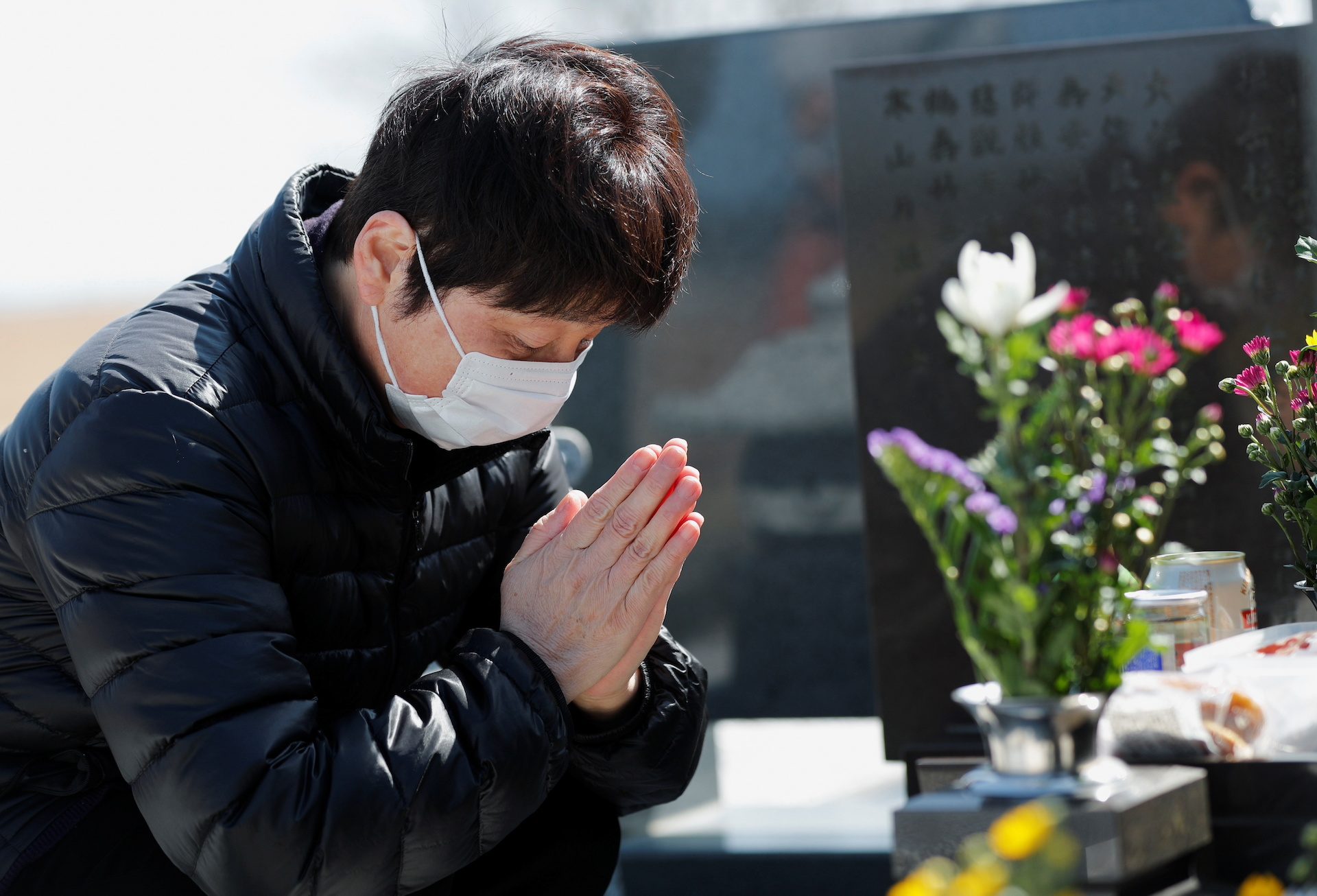 10 years on, Japan mourns victims of earthquake and Fukushima disaster