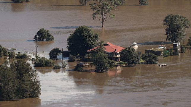 Some Australians return home as others evacuated in floods crisis