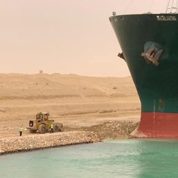 Ship blocking Suez Canal like ‘beached whale’ could be stuck for weeks