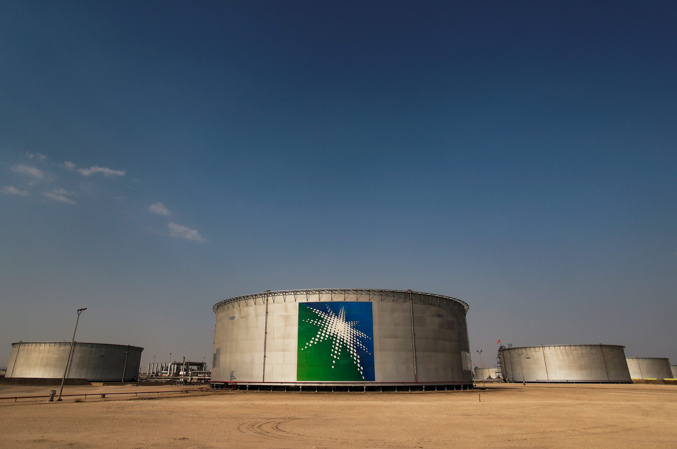 Saudi oil giant Aramco to scale back spending after 2020 profit slump