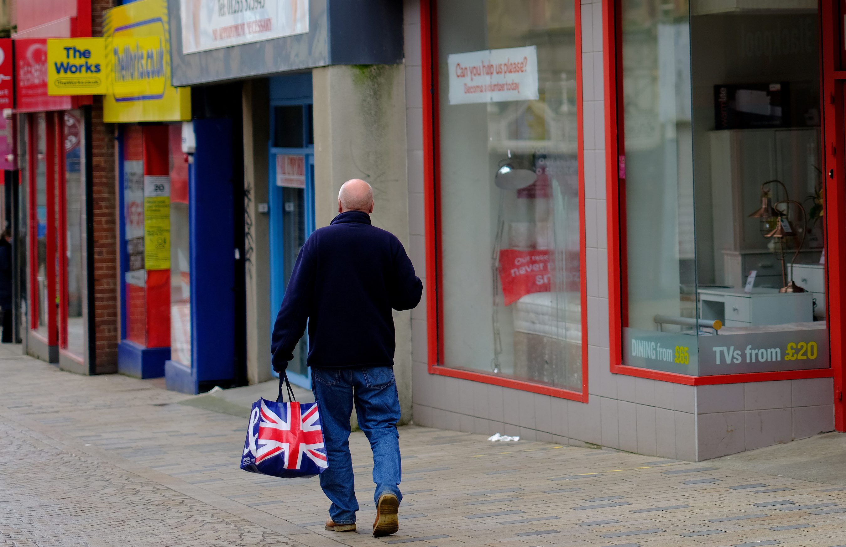 UK economy grew more than thought at end of miserable 2020