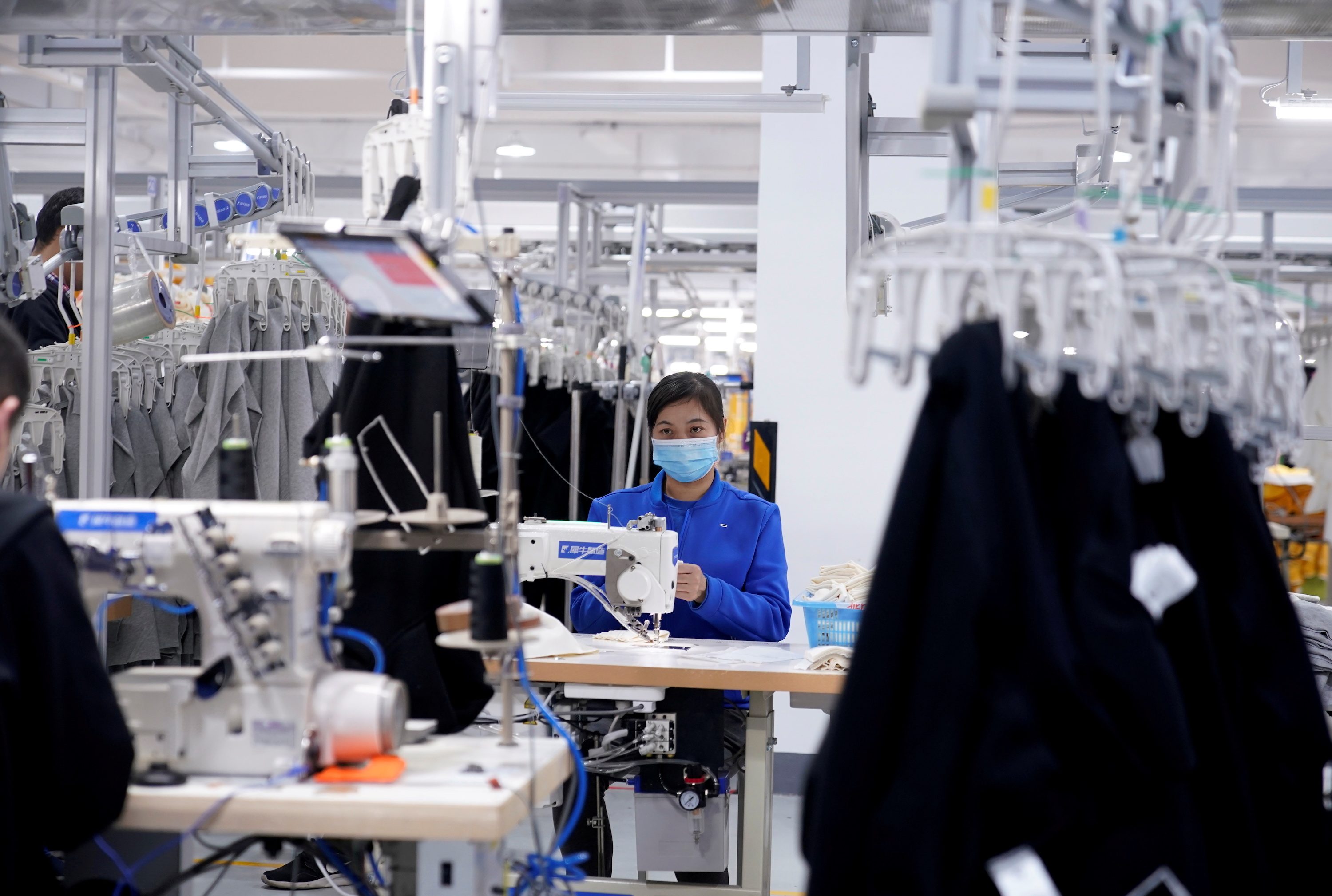 China’s factory activity growth slows on supply bottlenecks, soft demand