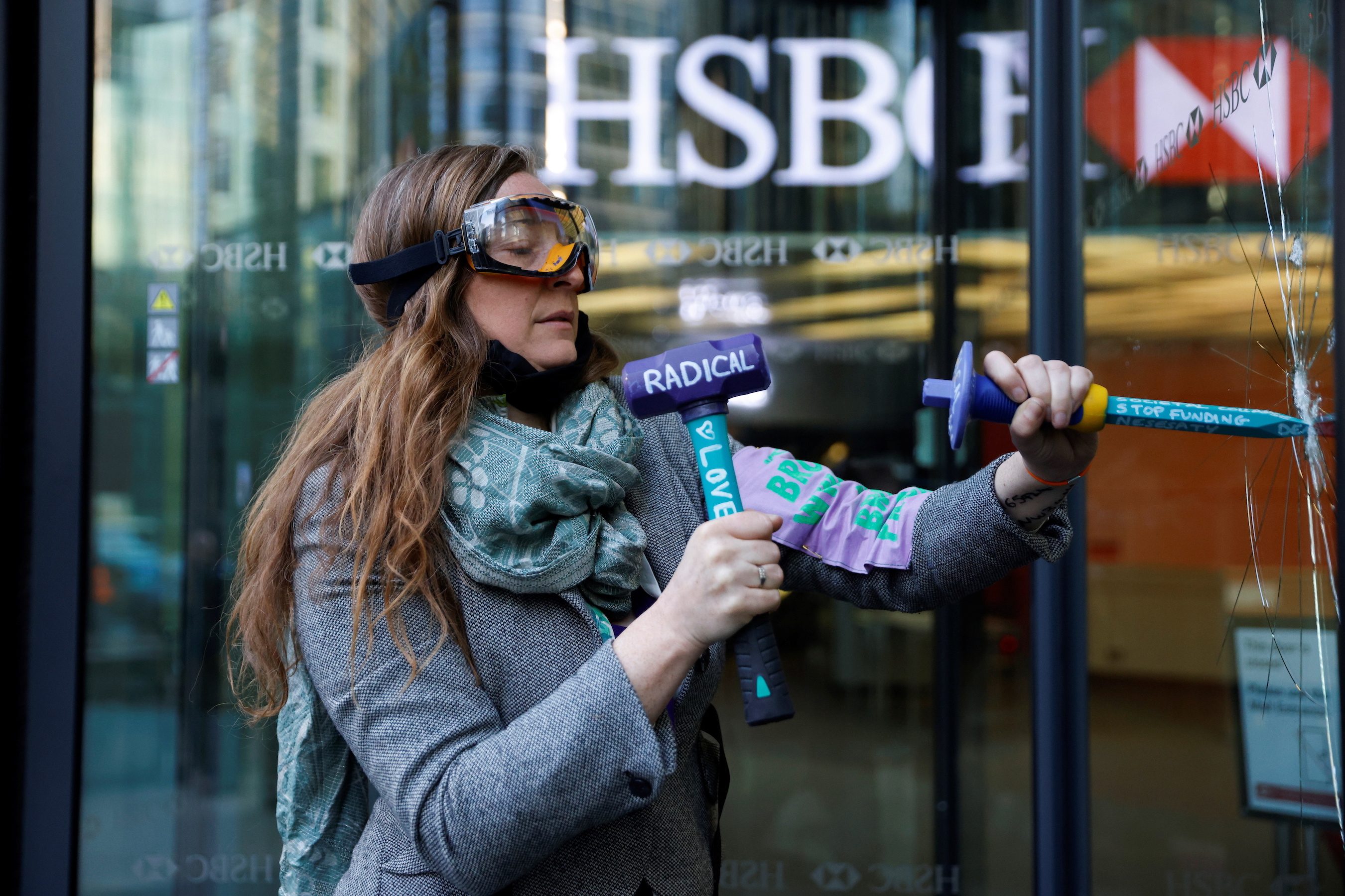 Climate activists shatter 19 windows at HSBC headquarters in London